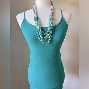 Long waisted teal spaghetti strap soft camisole